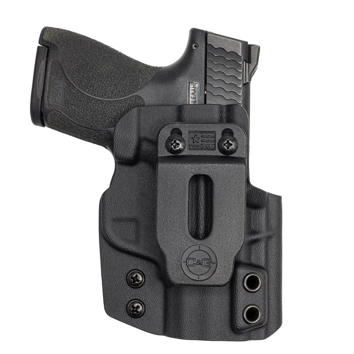 Clip-side view of black IWB COVERT Shield holster with pistol inserted, grip pointing left.
