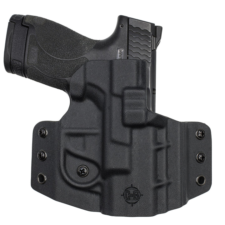 Front view of right-hand C&G OWB COVERT holster with an S&W M&P Shield holstered, grip facing left.

