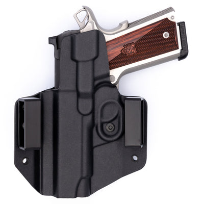 This is a custom C&G Holsters OWB Outside the waistband Holster for the Springfield EMP Champion 1911.