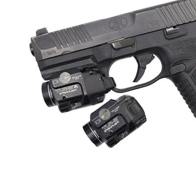 FN 509 firearm with streamlight TLR8 weapon light