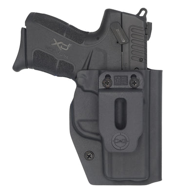 Springfield XD-E IWB Covert Kydex Holster Made by C and G Holsters. This Image is of the front of the holster showing the Branded belt clip. The Springfield XDE firearm is in the holstered position.